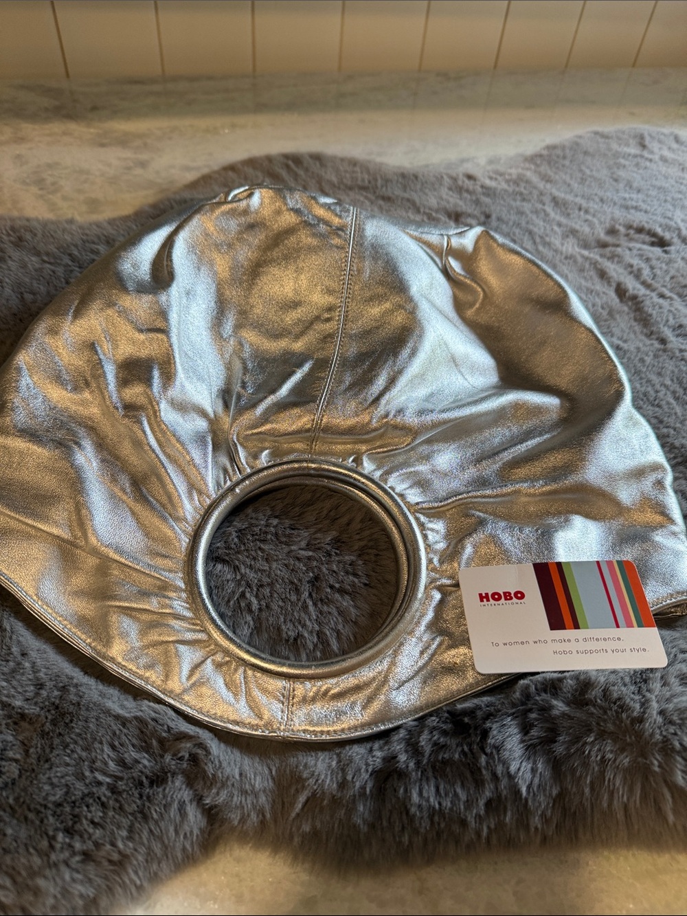 HOBO Metallic Silver Circular Handle Shoulder Bag